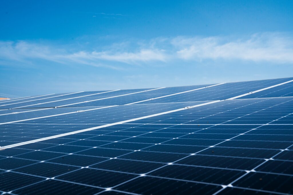 Commercial rooftop solar panels representing corporate ESG reporting and precision energy metering